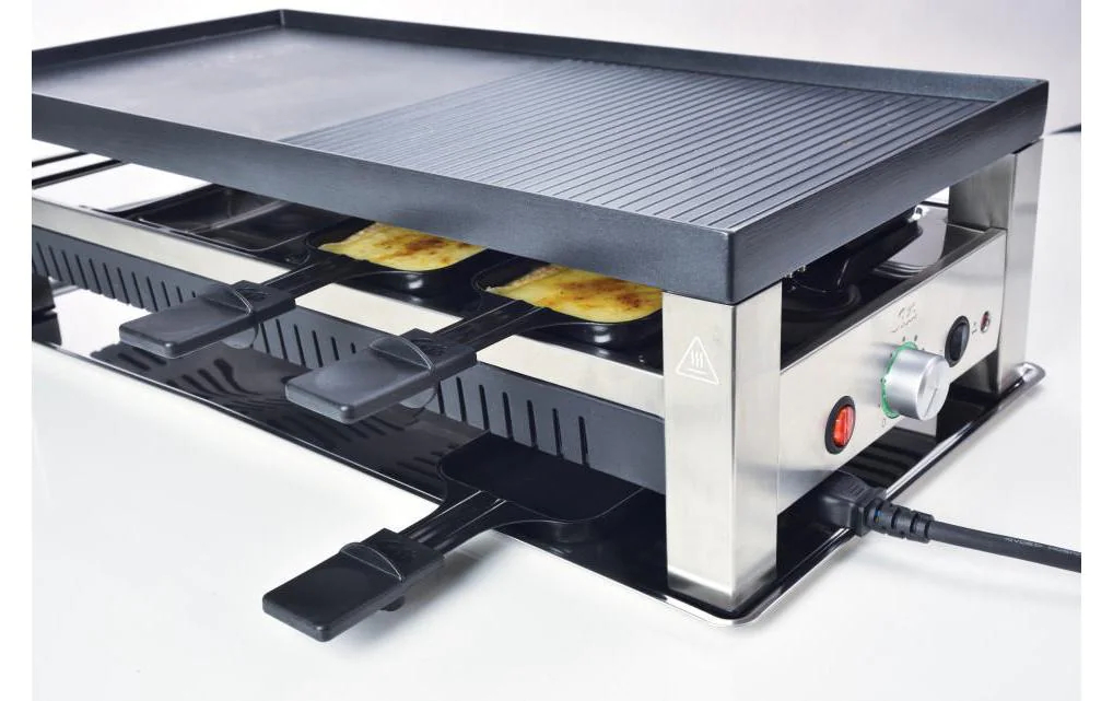 Solis 5 in 1 Table Grill Typ 791 Anzahl Personen: 8, Funktionen: Crepe-Funktion, Mini-Wok, Mini-Pizzas, Raclette, Tischgrill, Kaltzone als Pfännchenablage, Grillplatte: Edelstahl, Pfännchenablage, Zuschaltbare Unterhitze